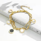 gold-tone layered charm bracelet