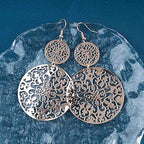pair of dangling filigree earrings